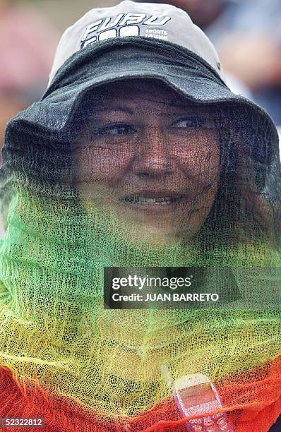 Una trabajadora sexual con el rostro velado participa en una manifestacion en celebracion del "Dia Internacional de la Mujer", en el centro de la...