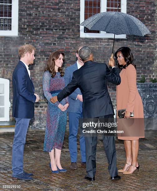 Prince Harry, Catherine, Duchess of Cambridge, Prince William, Duke of Cambridge, US President Barack Obama and First Lady Michelle Obama speak as...
