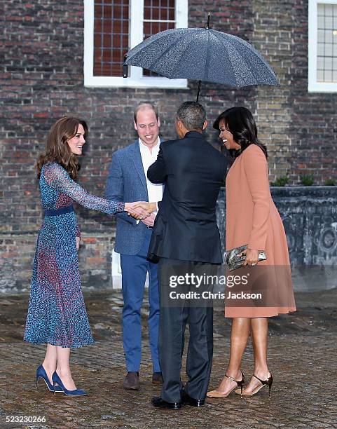 Catherine, Duchess of Cambridge and Prince William, Duke of Cambridge greet US President Barack Obama and First Lady Michelle Obama as they attend a...