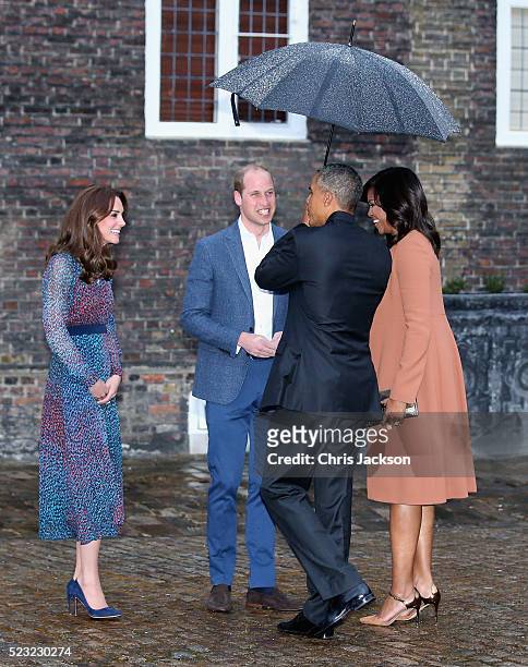 Catherine, Duchess of Cambridge and Prince William, Duke of Cambridge greet US President Barack Obama and First Lady Michelle Obama as they attend a...