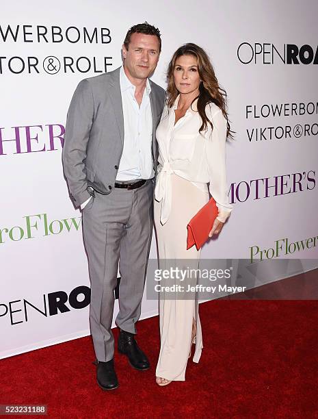 Actors Jason O' Mara and Paige Turco attend the Open Roads World Premiere of 'Mother's Day' at the TCL Chinese Theatre IMAX on April 13, 2016 in...