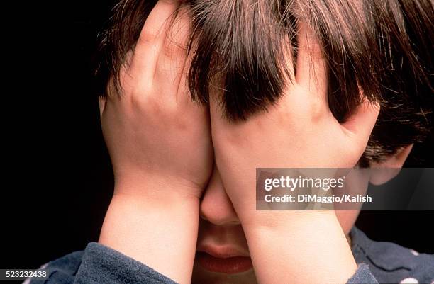 unhappy child - domestic violence stock pictures, royalty-free photos & images