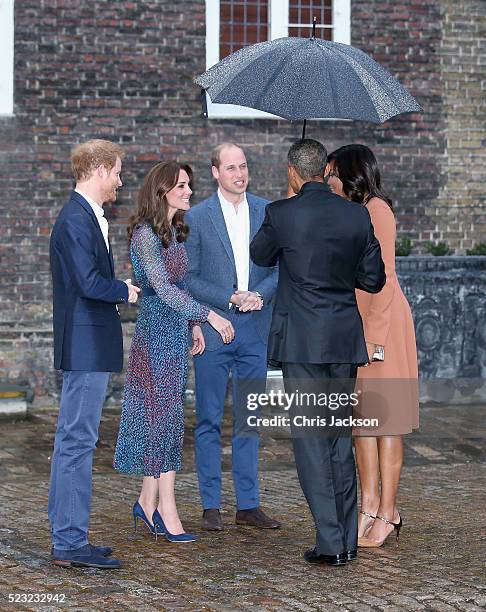 Prince Harry, Catherine, Duchess of Cambridge, Prince William, Duke of Cambridge, US President Barack Obama and First Lady Michelle Obama speak as...