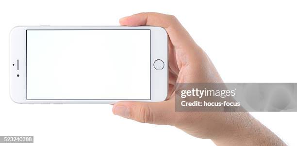 main tenant vierge écran de l'iphone 6 plus de - iphone photos et images de collection