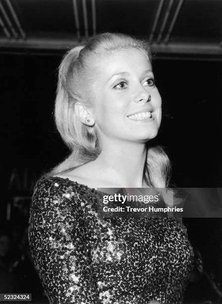 French actress Catherine Deneuve at the world premiere of Roman Polanski's psychological thriller 'Repulsion', in which she stars, at the Rialto...