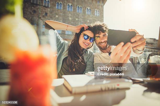 tourists  take a selfie in firenze - florence italy city stock pictures, royalty-free photos & images