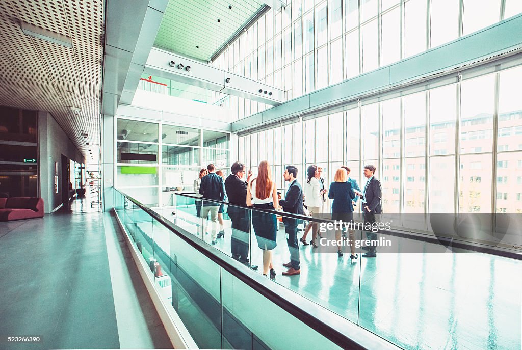 Group of business people in the office building lobby