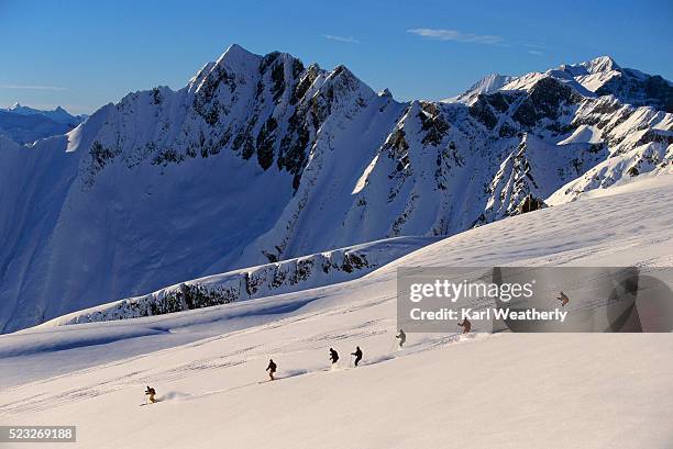 heli-skiing in the cariboo mountains - cariboo stock pictures, royalty-free photos & images