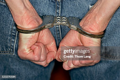 Man in Handcuffs Man in Handcuffs
