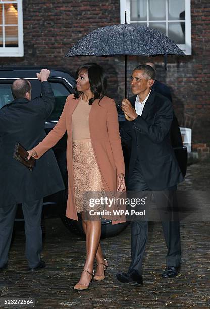 President Barack Obama and First Lady Michelle Obama arrive for dinner with Prince Harry, Prince William, Duke of Cambridge and Catherine, Duchess of...