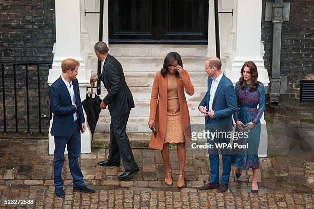 Prince Harry, US President Barack Obama, First Lady Michelle Obama, Prince William, Duke of Cambridge and Catherine, Duchess of Cambridge pose as...