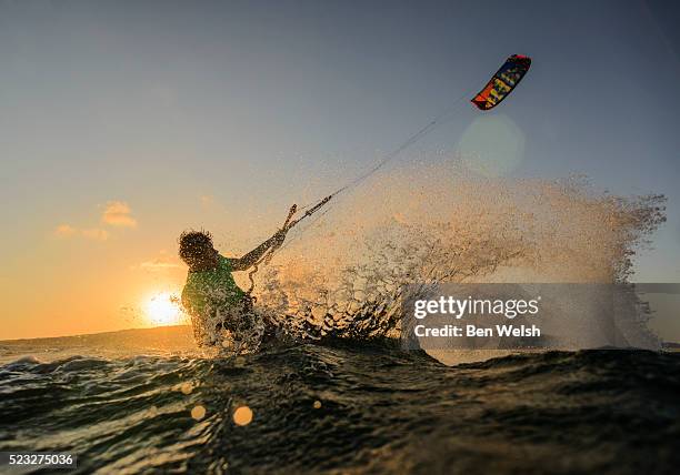 view of young man kitesurfing, tarifa, costa de la luz, andalusia, spain - tarifa stock pictures, royalty-free photos & images