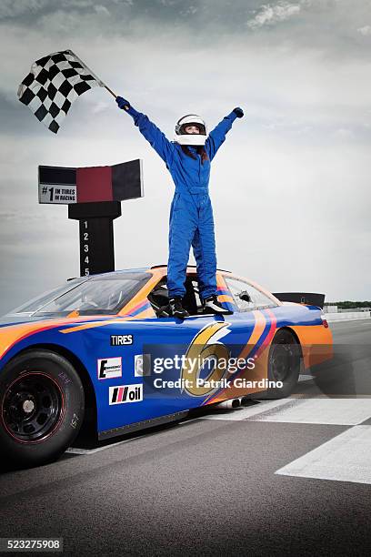 Standing Racer 76,303 Car Racer Standing Stock Photos, High-Res Pictures, and Images ...