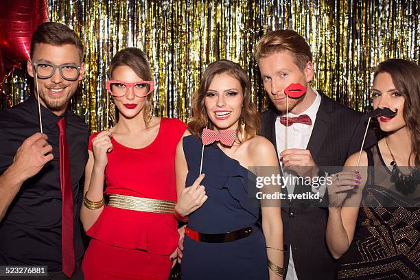 party. - christmas photo booth stock pictures, royalty-free photos & images