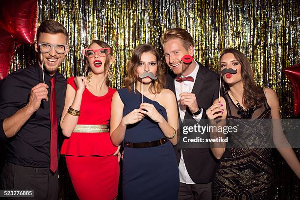 party. - christmas photo booth stock pictures, royalty-free photos & images