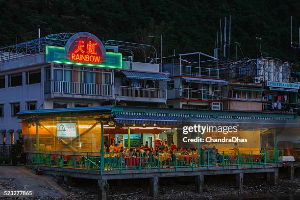 china: restaurant on lamma island in hong kong; blue hour - byggnadsdetalj bildbanksfoton och bilder