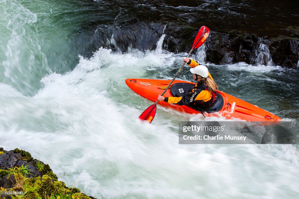 Female kayaking in the river