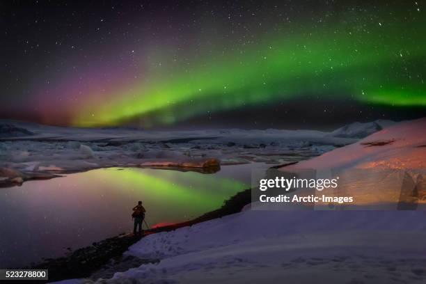 aurora borealis or northern lights, iceland - jökulsárlón lagoon fotografías e imágenes de stock