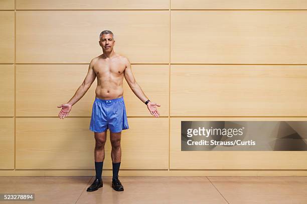 businessman wearing boxer shorts - boxer vintage stockfoto's en -beelden