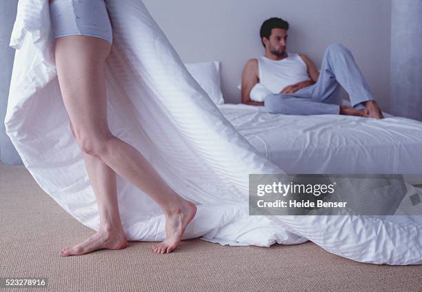 man and woman in bedroom - ignoring stock pictures, royalty-free photos & images