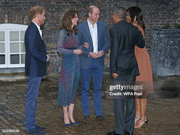 President Barack Obama and First Lady Michelle Obama are greeted by Prince Harry, Prince William, Duke of Cambridge and Catherine, Duchess of...