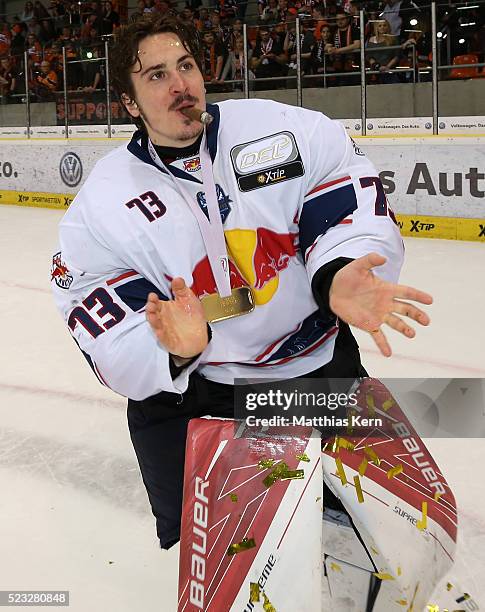 Goalkeeper David Leggio of Muenchen celebrates after winning the DEL playoffs final game four between Grizzlys Wolfsburg and Red Bull Muenchen at Eis...