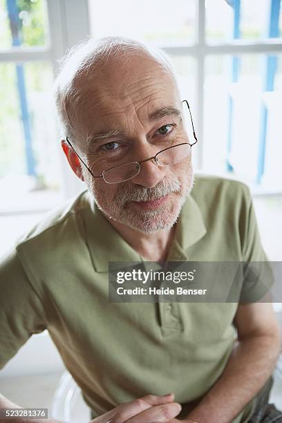 man - polo shirt stock pictures, royalty-free photos & images