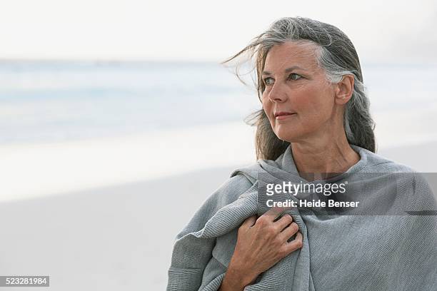 woman on beach - beautiful woman gray hair stock pictures, royalty-free photos & images