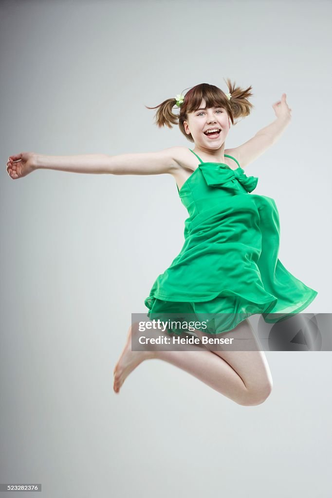 Girl jumping for joy