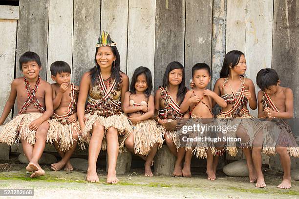 portrait of kids (6-7, 8-9) and teacher, amazon river basin, ecuador - tribal stock pictures, royalty-free photos & images