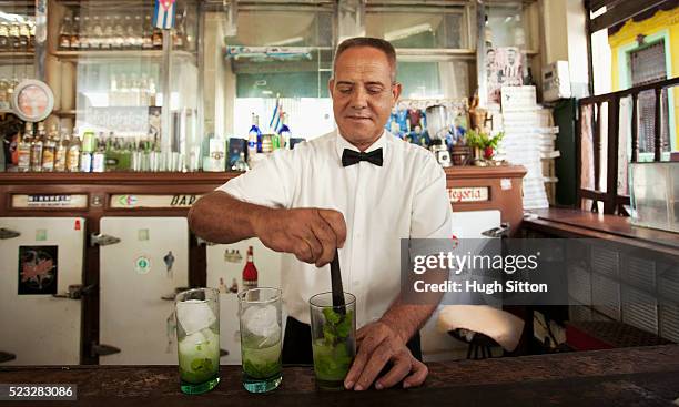 barman in havana, cuba. - daily life in cuba stock pictures, royalty-free photos & images