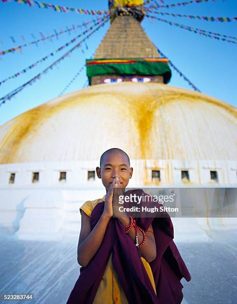 portrait of young buddhist monk at boudhanath stupa in kathmandu - nepal portrait stock pictures, royalty-free photos & images