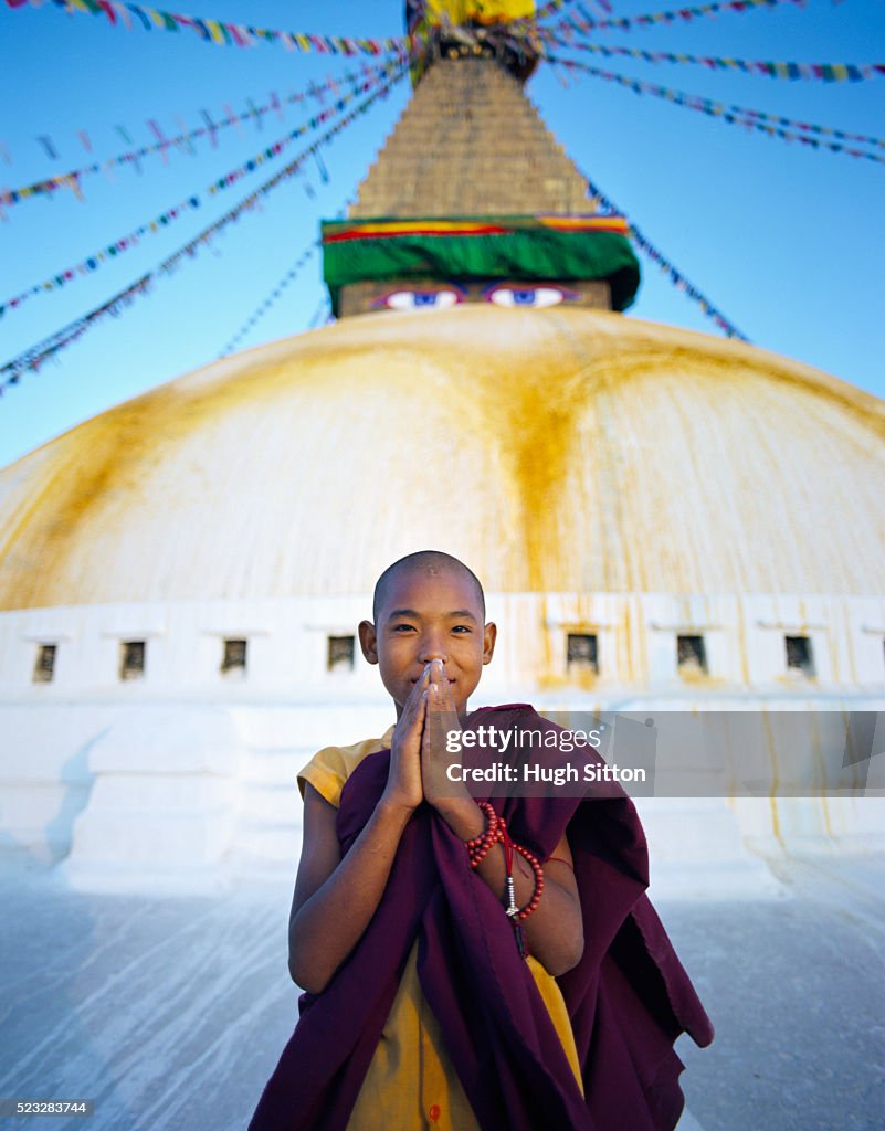 Portrait of young Buddhist monk at Boudhanath stupa in Kathmandu