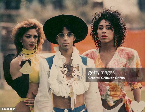 Prince poses with Sheila E. And Cat during his Love Sexy '88 Tour at Feijenoord Stadion in 1988 in Rotterdam, Netherlands.