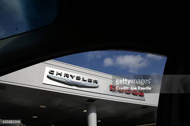 Chrysler and Dodge sign is seen on a dealership as Fiat Chrysler Automobiles announced that it is recalling more than 1.1 million cars and SUVs...