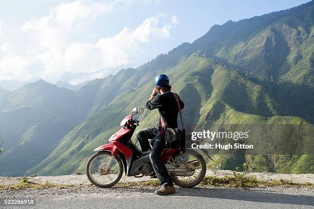 tourist travelling in the mountains near sapa. vietnam - vietnam travel stock pictures, royalty-free photos & images