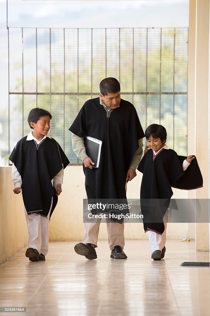 School children (6-7) wearing traditional Ecuadorian costume, Ecuador