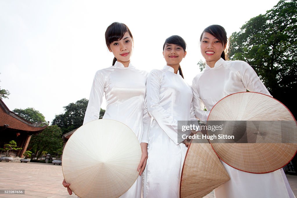 Vietnamese women at Temple of Literature. Hanoi. Vietnam.