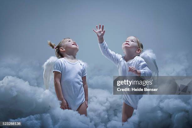 toddlers dressed at angels - baby angel wings stock pictures, royalty-free photos & images