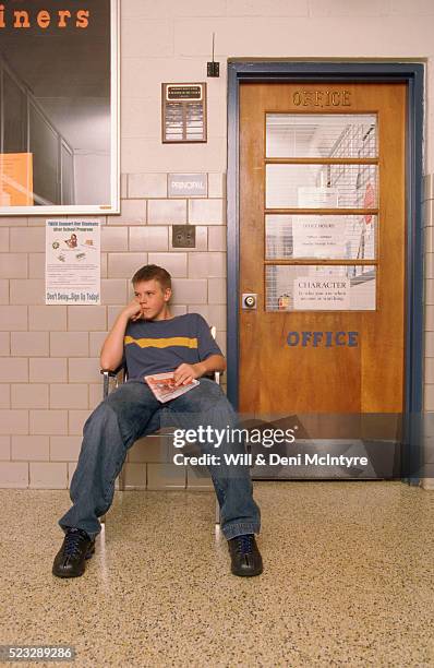 student waiting outside principal's office - punishment stock pictures, royalty-free photos & images