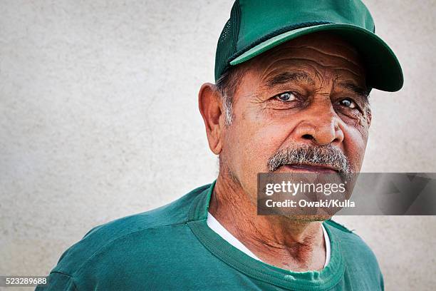 man wearing green cap - marfa bildbanksfoton och bilder