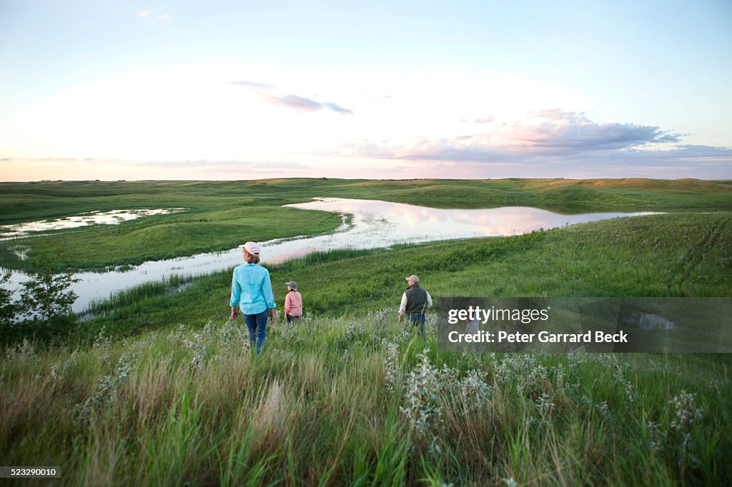 Family walking down hill