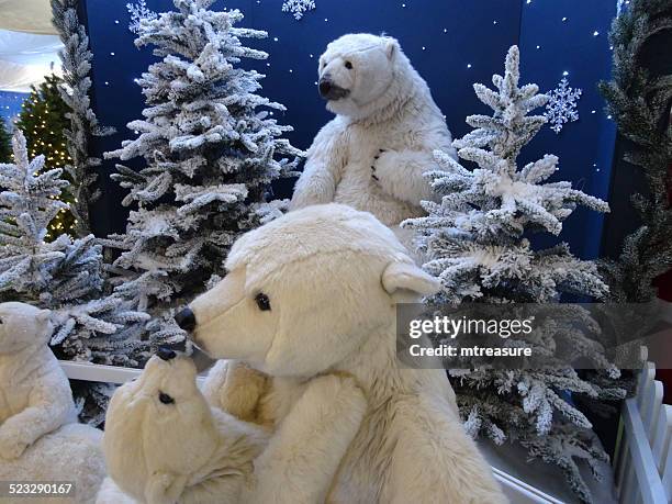 large cuddly life-size cartoon / fluffy toy polar bears, baby-polar-bear, winter-display - antarctica polar bear stock pictures, royalty-free photos & images