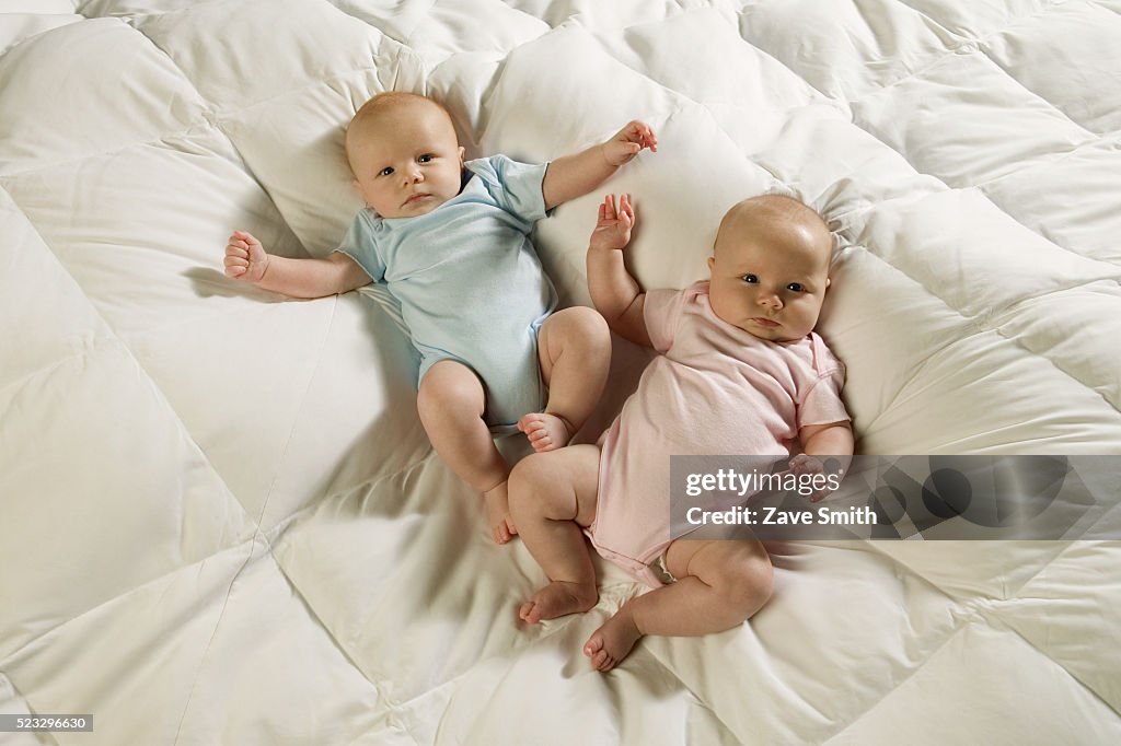 Twin Babies on Bed