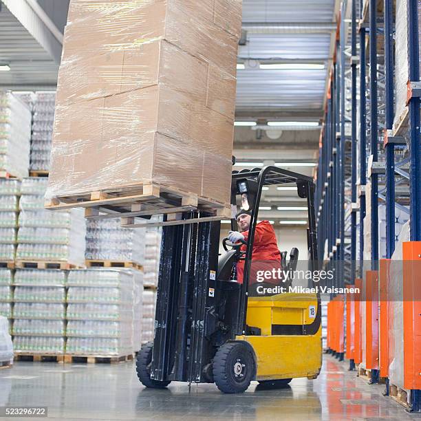 618 Warehouse Worker Lifting Boxes Stock Photos, High-Res Pictures, and ...