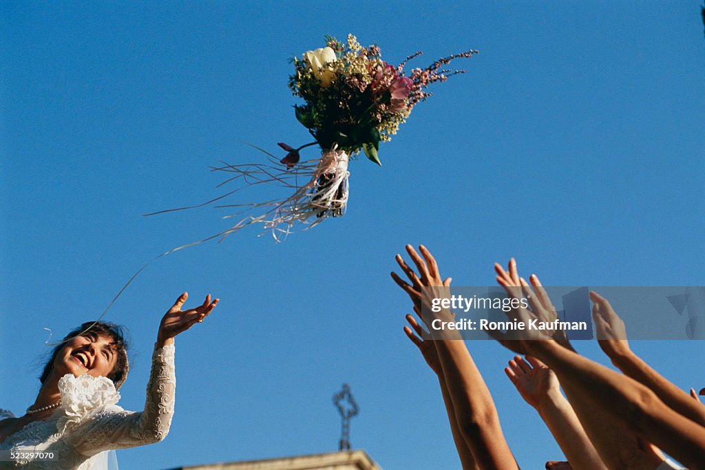 Bride Throwing Bouquet