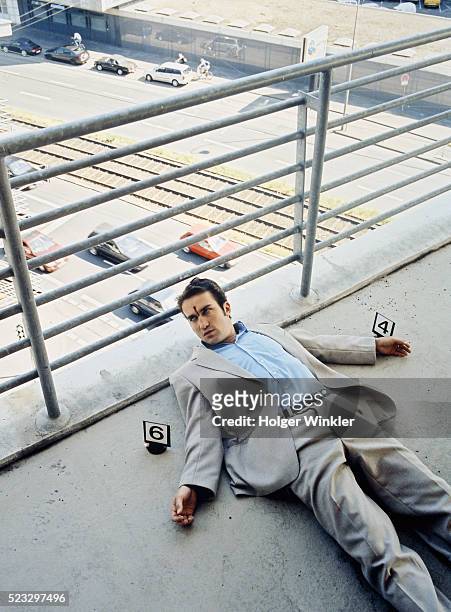 corpse of a man with point of entry in the forehead - bullet hole blood stock pictures, royalty-free photos & images