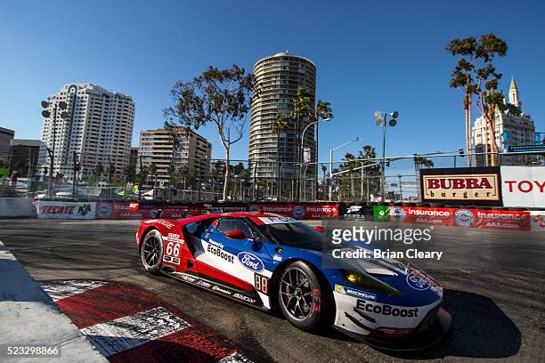 The Ford GT of Joey Hand and Dirk Muller races through a turn during the IMSA WeatherTech Series race at Toyota Grand Prix of Long Beach on April 16,...