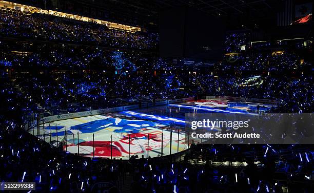 Fans of the Tampa Bay Lightning light up the arena before the game against the Detroit Red Wings in Game Two of the Eastern Conference Quarterfinals...