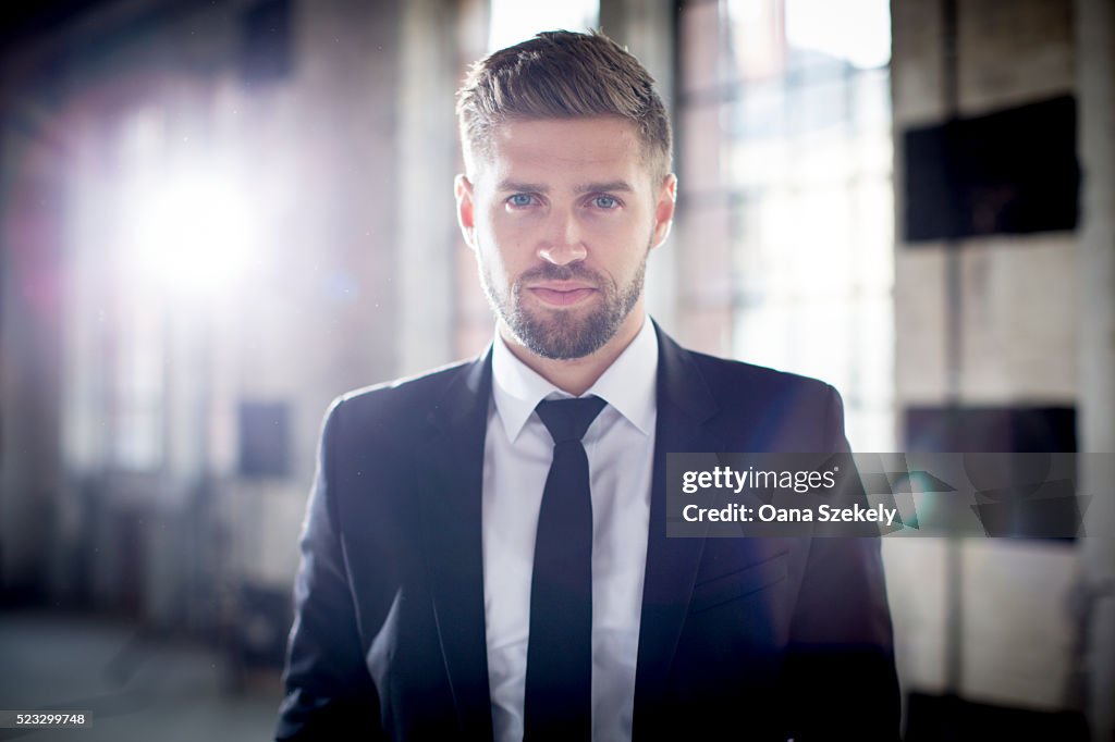 Portrait of handsome man in suit